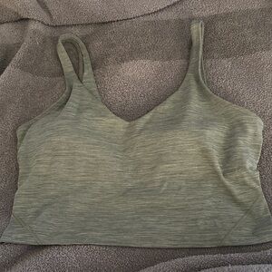 Lululemon align tank bra. Size 12, green has pads. EUC, small hole in front seam